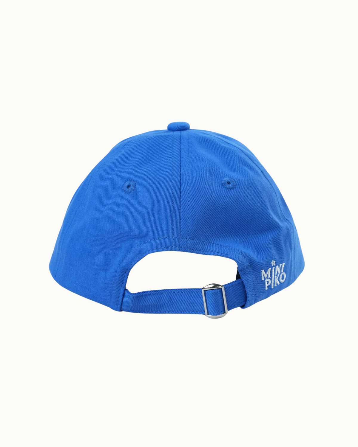 A bright blue baseball cap shown from the back, featuring an adjustable strap with a silver metal buckle and a small white 'MINI PIKO' logo on the side, set against a plain off-white background.